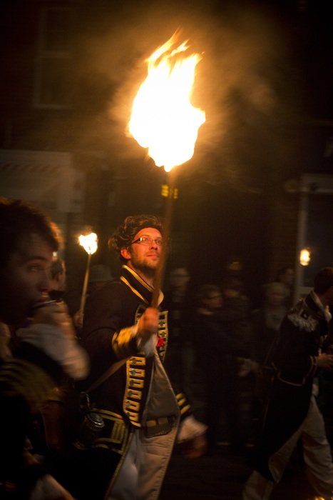 man with a torch at night