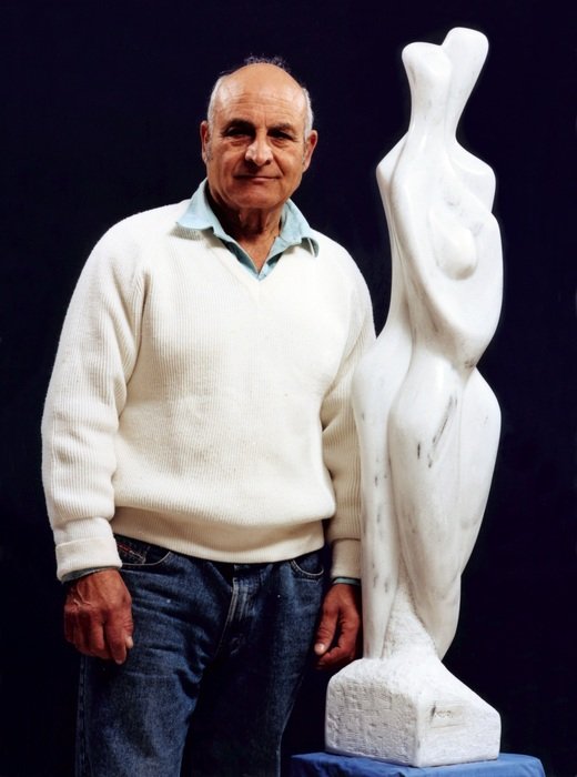 the man and the sculpture of marble
