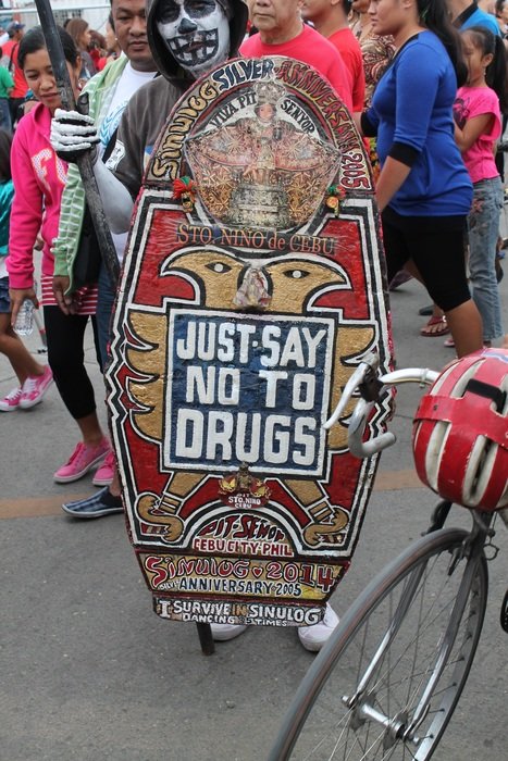 protest against drugs with a shield in colombia