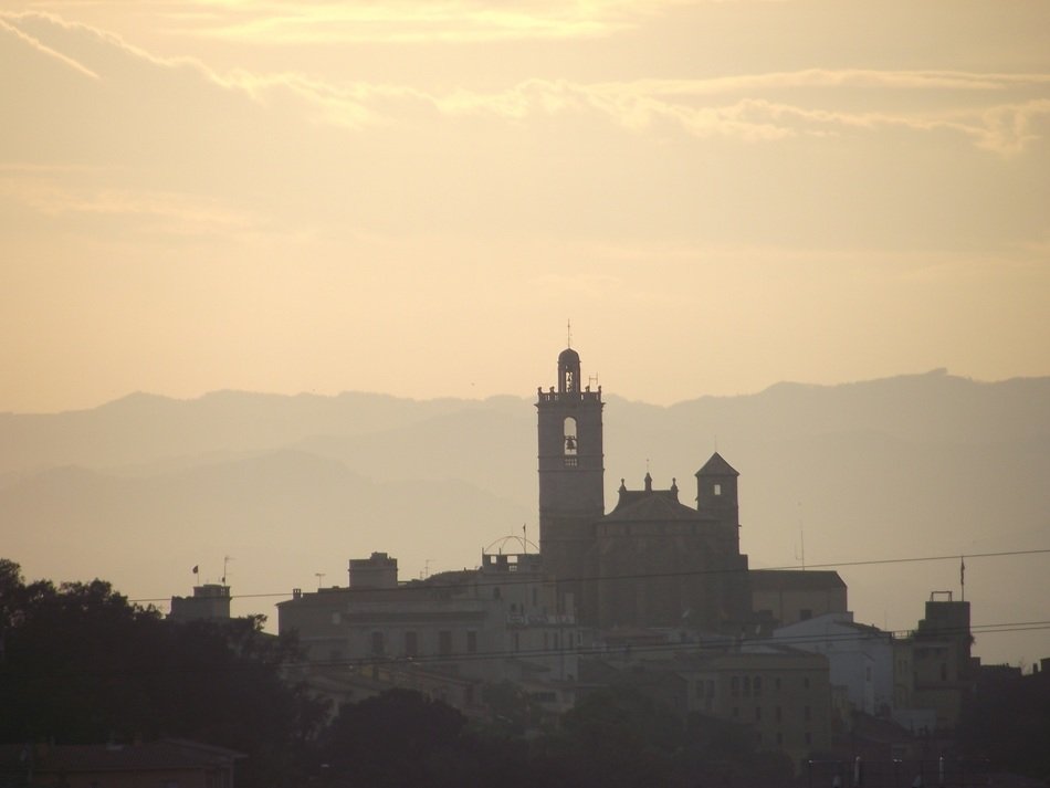 Photo of the bell tower at dusk in Llagostera