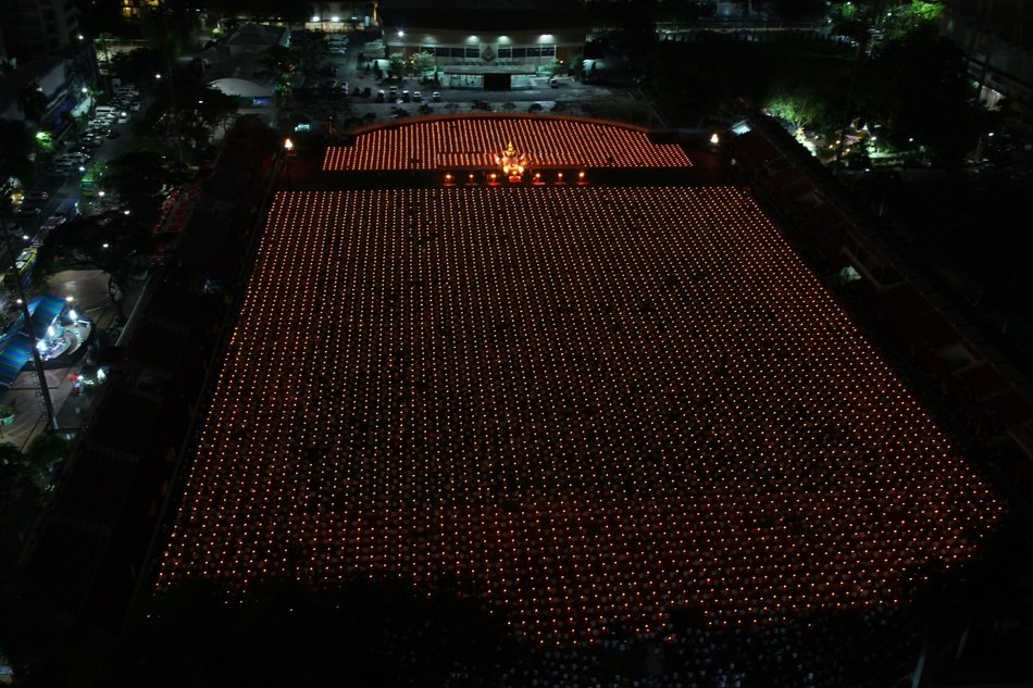 photo of Buddhists meditation at sunset