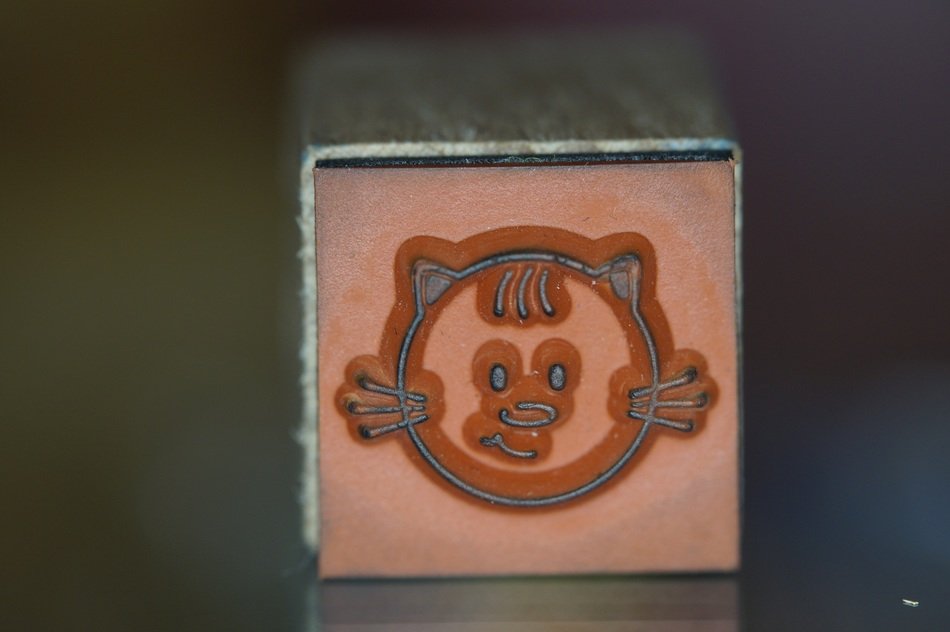stamp with cat face