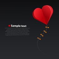 Heart kite on dark background