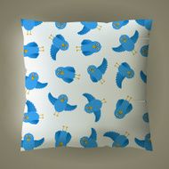 Pillow with blue bird pattern