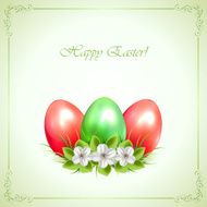 Three decorative Easter eggs on green background