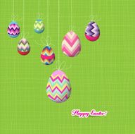 happy easter eggs hanging on the wire background