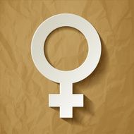 Venus symbol white on a crumpled paper brown background
