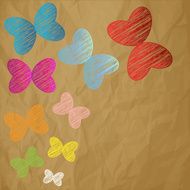 Colored scribble butterflies on a crumpled paper brown background