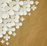 Bouquet of white flowers in the corner on brown background