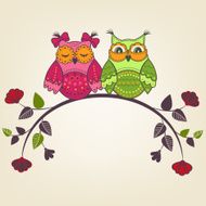 Two beautiful owls on a branch with flowers N2