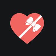 Gift box of heart tied with ribbon