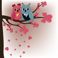 Two owls in a tree lovers with hearts