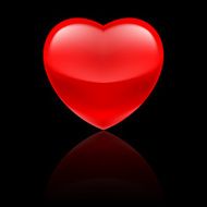 Glossy red heart on black