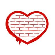Red heart on brick wall