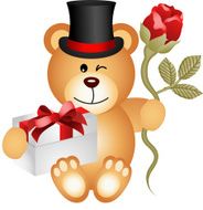 Teddy bear with gift box and red rose