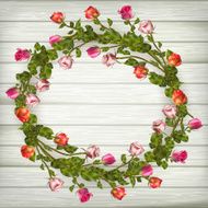 Roses wreath on wooden background EPS 10