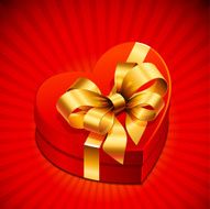 heart shape gift with golden bow