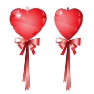 red balloon heart with ribbon bow on white background