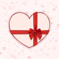 Paper heart with red ribbon and a bow Valentines day