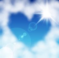 Heart shaped cloud in the blue sky