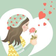 Beautiful girl in love with rose