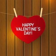 Paper hearts on wooden background