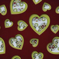 Seamless background with cut out silhouettes of hearts