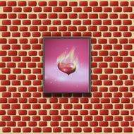 paintings with glowing hearts on a brick wall N2
