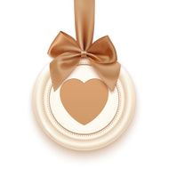 Badge with heart golden ribbon and a bow