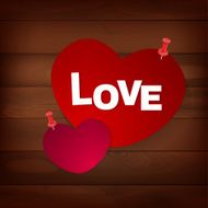 pinned heart on wood N3
