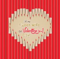 valentines day greeting in heart shape out of pencils