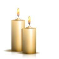 Two burning candles on white background