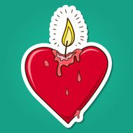 Heart shaped burning candle