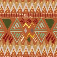 Hand drawn tribal ethnic colorful seamless pattern on orange background