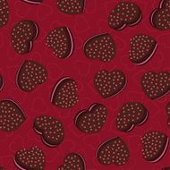 Seamless background with cookies in the shape of hearts N12