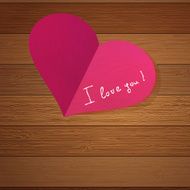 Origami heart on wooden with copy-space EPS8