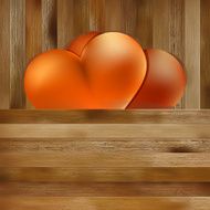 Two hearts on brown wooden background EPS8
