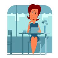 Woman sitting in cafe and using a tablet