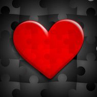 red heart of puzzle on a background black puzzles