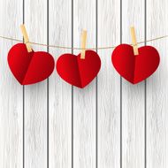 Paper hearts on wooden background N7