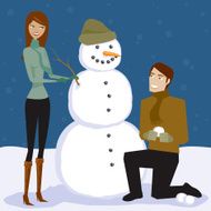 Couple Building a Snowman