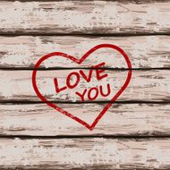 Heart symbol on wooden boards