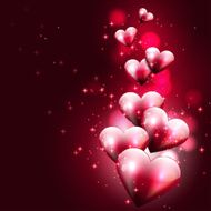 Flying hearts on dark background
