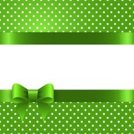 Summer background with polka dots a green bow