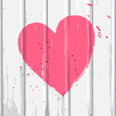 Pink heart on white wall
