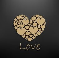 golden heart on dark gray background