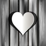 Abstract heart on wooden background