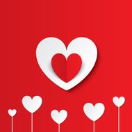 White paper hearts Valentines day card on red