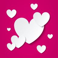 Paper hearts Valentines day card on pink
