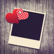 grunge valentine background with two hearts and photo frame